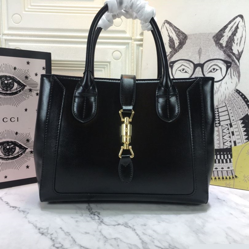 G*u*i shopping bags